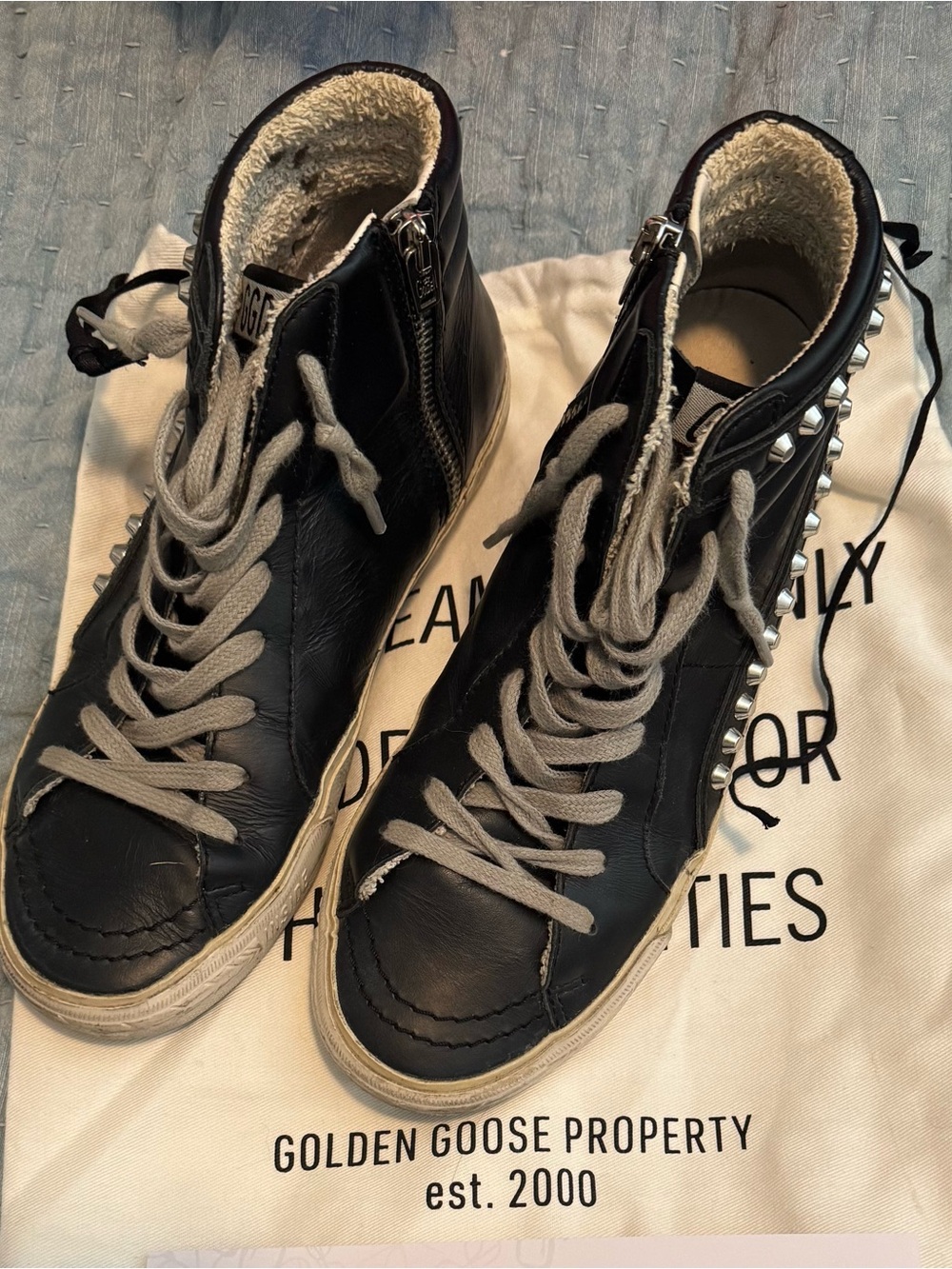 Golden Goose Black studded high tops size 37/7 

Gently used